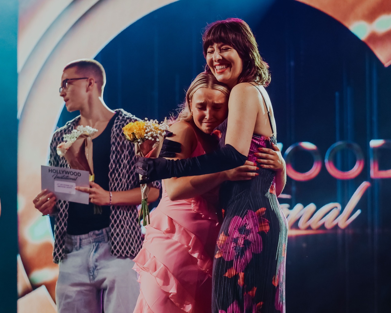 Cat Rendic hugging an award recipient